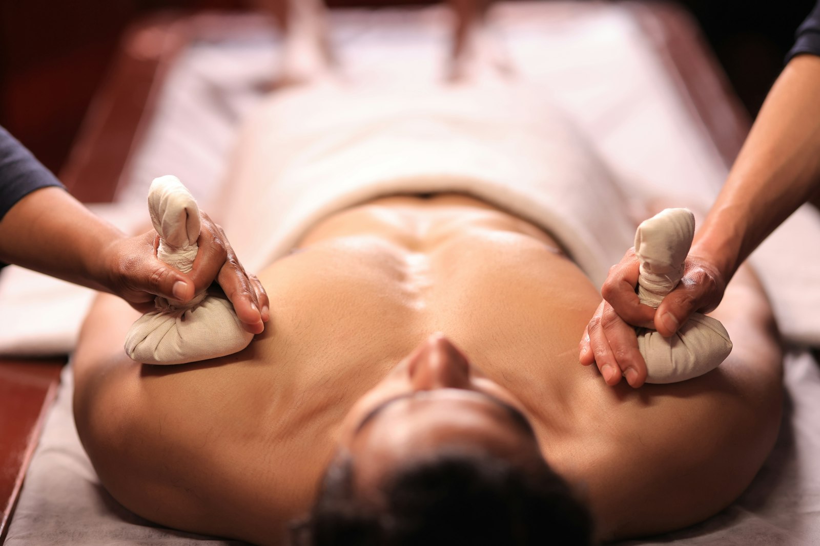 Herbal ball compress massage